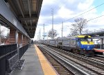 DE30AC # 418 pushing westbound LIRR Oyster Bay-Jamaica train # 6507 past NHP